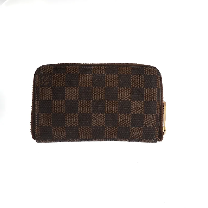 Louis Vuitton backpacks with a multi - pocket organization for functionalityLOUIS VUITTON Wallet in Brown Canvas