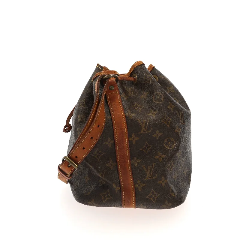 Ladies Louis Vuitton Petite Malle bags in a pastel color for a soft lookLOUIS VUITTON Noe Shoulder Bag in Brown Canvas