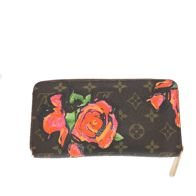 Louis Vuitton bags with a snap - button closure and a decorative charm for styleLOUIS VUITTON x Stephen Sprouse Roses wallet Monogram