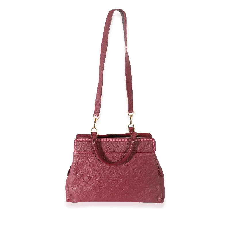 Louis Vuitton handbags with a beaded trim for a touch of glamourLOUIS VUITTON Raisin Empreinte Vosges MM