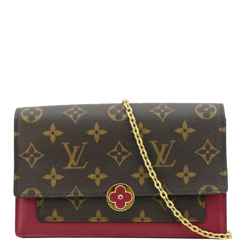 Louis Vuitton crossbody bags in a bold red color for a statementLOUIS VUITTON Flore Monogram Canvas Chain Wallet Shoulder Bag Fuchsia