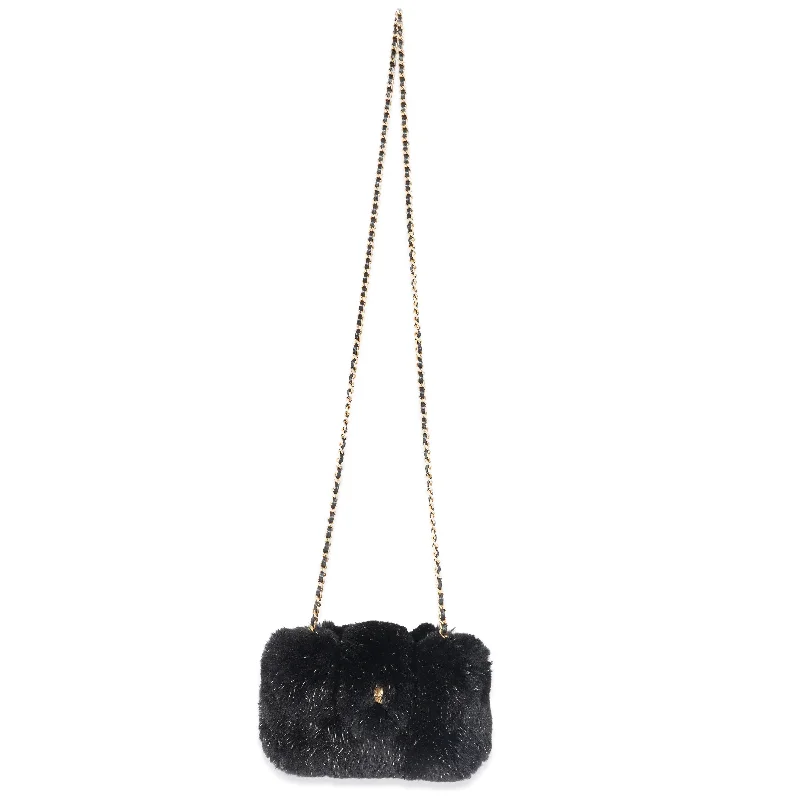 Chanel Quilted Leather Shoulder Bag for FashionistasCHANEL CC Black Fur Chain Clutch