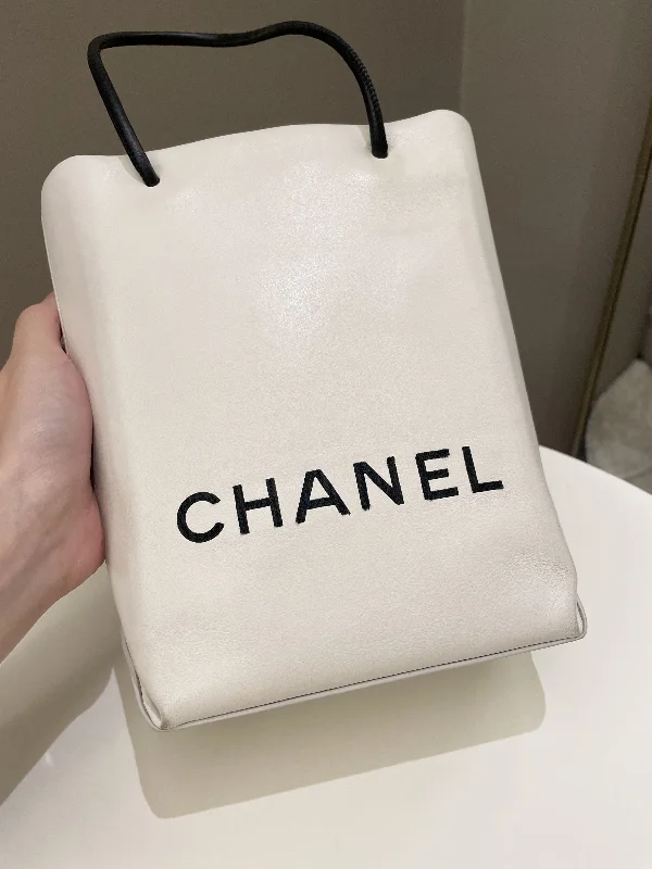 Chanel Black Handbag for Business MeetingsChanel Vertical Shopping Bag Ivory / Black Calfskin