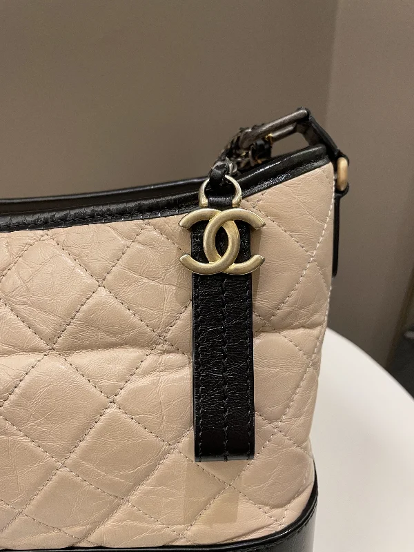 Chanel New Arrival Handbag with Gold HardwareChanel Quilted Gabrielle Hobo Beige / Black Aged Calfskin