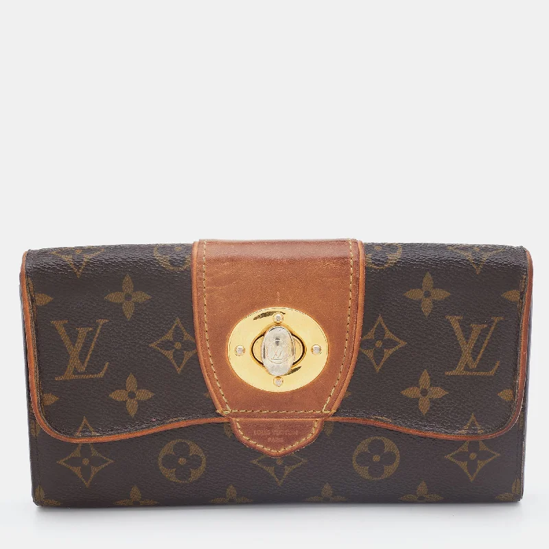 Ladies Louis Vuitton Capucines bags with gold - toned hardwareLOUIS VUITTON Monogram Canvas Boetie Wallet